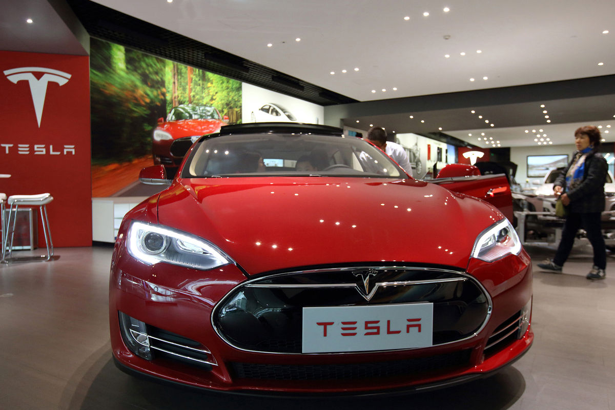Китайское подразделение Tesla увольняет сотрудников из-за слабых продаж - 1