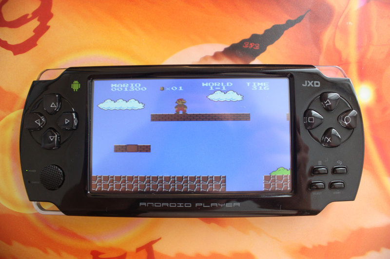 Обзор портативной игровой консоли на базе Android JXD S601 за 77$