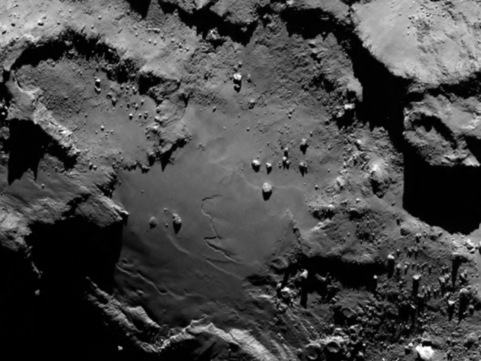 The lower side of 67P/C-G’s larger lobe. The image was presented on the occasion of arrival on 6 Aug; it was taken from a distance of 130 km and the image resolution is 2.4 metres per pixel. Credits: ESA/Rosetta/MPS for OSIRIS Team MPS/UPD/LAM/IAA/SSO/INTA/UPM/DASP/IDA
