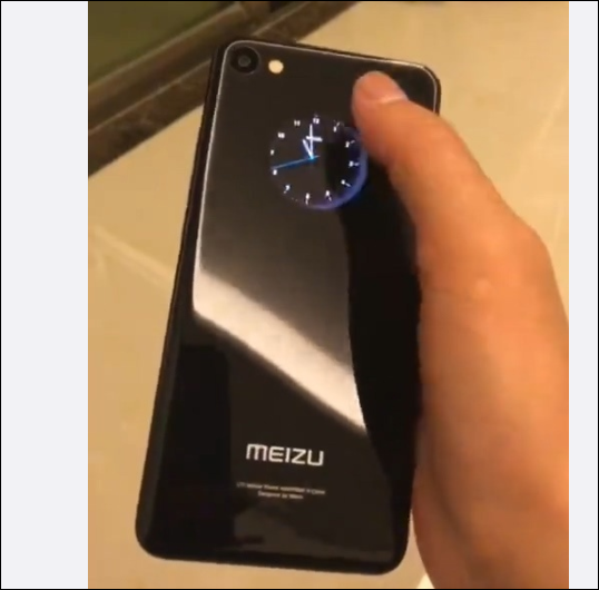Появились фотографии смартфона Meizu с круглым дополнительным дисплеем