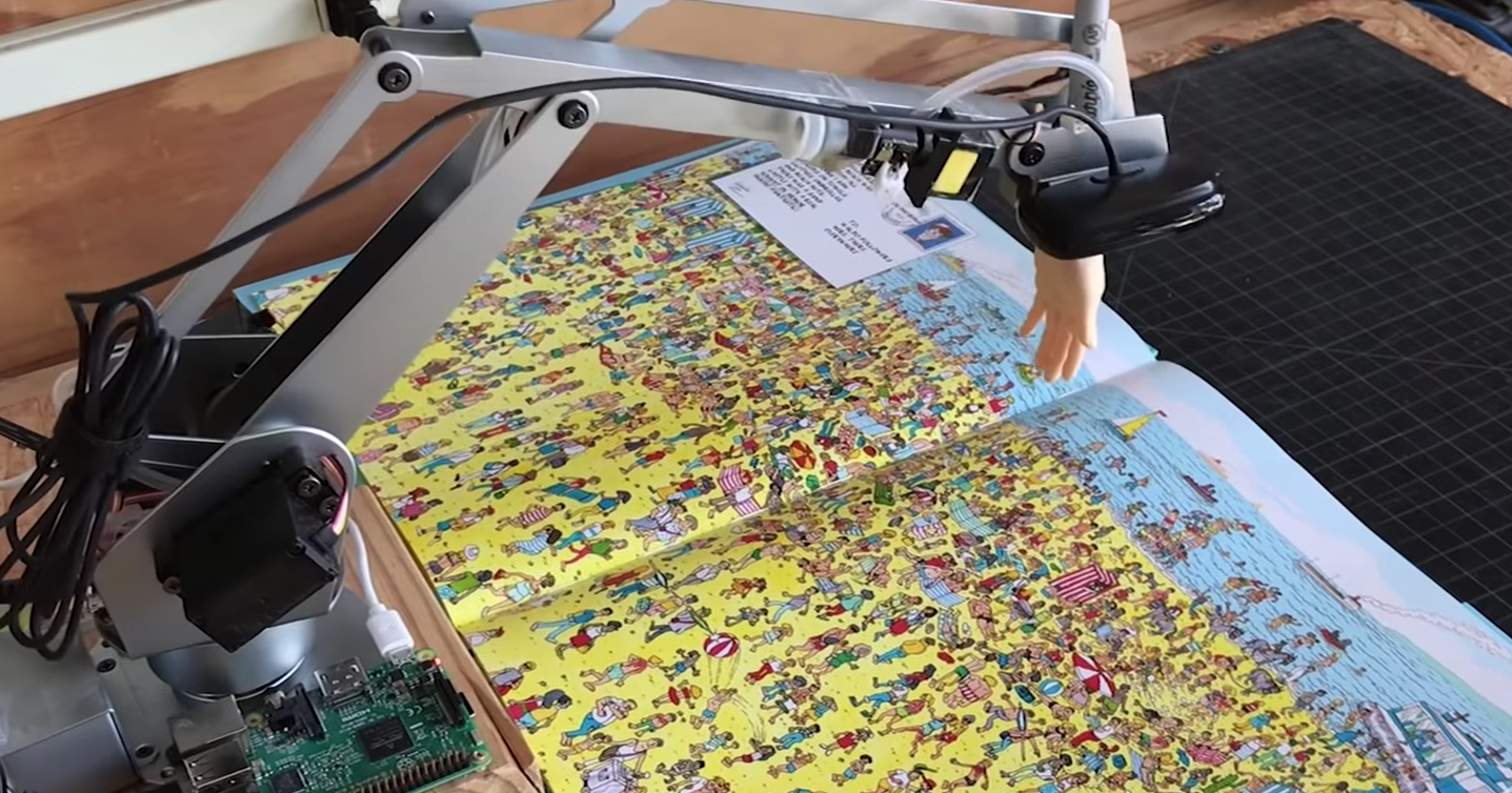 Робот с ИИ решает головоломку «Где Уолли?»