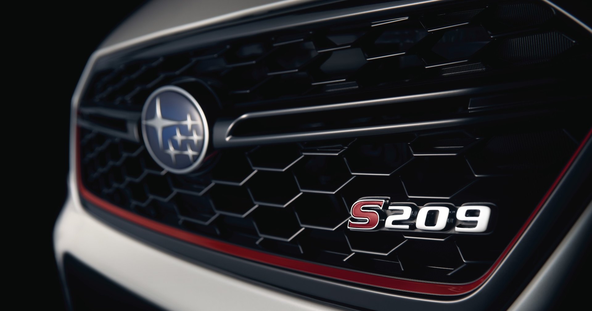 Subaru показала тизер новой модели STI S209 Subaru показала тизер новой модели STI S209