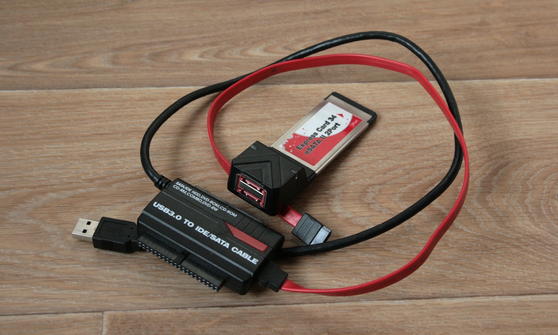 A small notebook for a system administrator - 8 USB to SATA/IDE and ExpressCard to SATA adapters