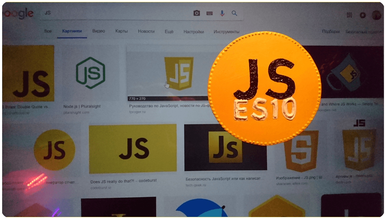 EcmaScript 10 — JavaScript в этом году - 1 КДПВ: Жёлтый магнит с надписью «JS ES10» на экране монитора — от kasper.green & elfafeya.art