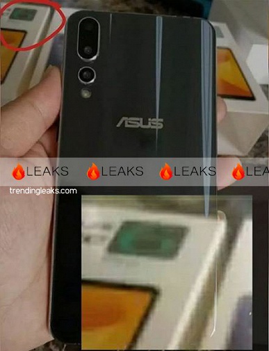 Серийный вариант смартфона Asus Zenfone 6 c градиентной тыльной панелью позирует на фото