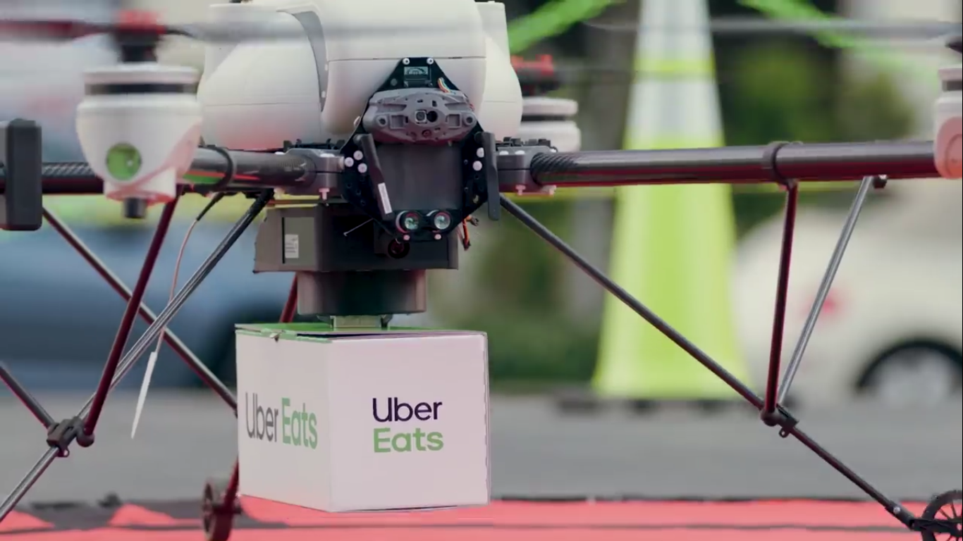 Uber Eats испытала процедуру доставки еды дроном в городе - 12