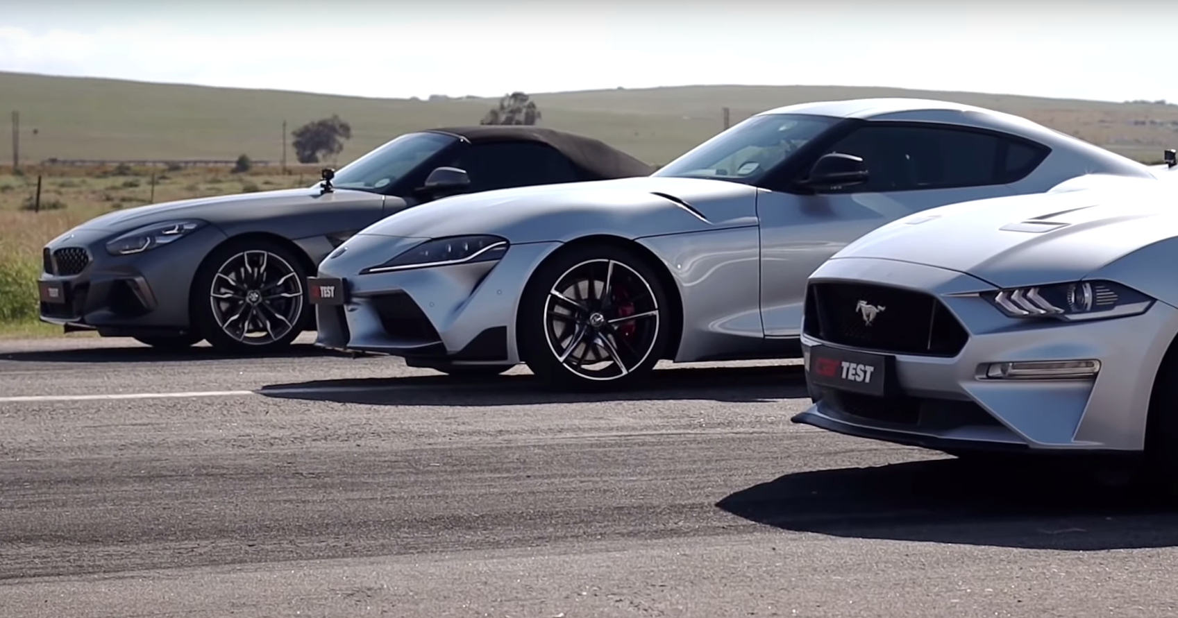 Toyota Supra против BMW Z4 и Ford Mustang GT: дрэг-гонка