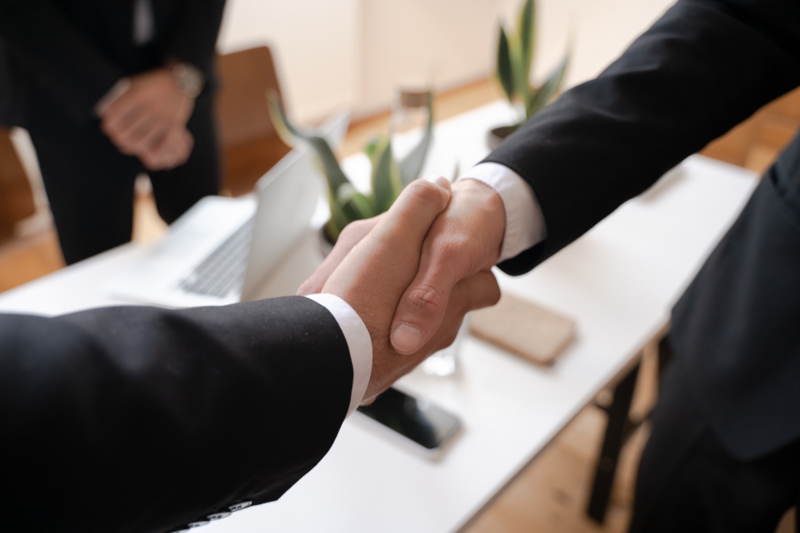 Photo by Pavel Danilyuk: https://www.pexels.com/photo/shallow-focus-of-two-people-handshaking-5520322/