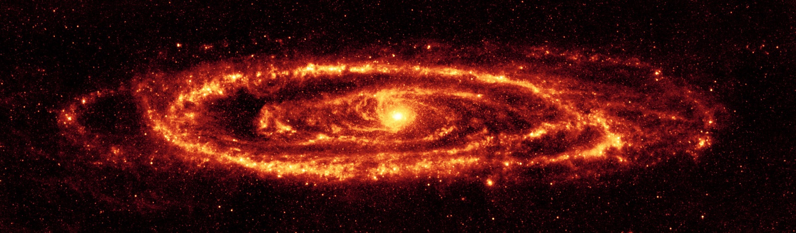 Изображение Галактики Андромеды в инфракрасном диапазоне спектра электромагнитных волн. Снимок получен космическим телескопом Спитцер  