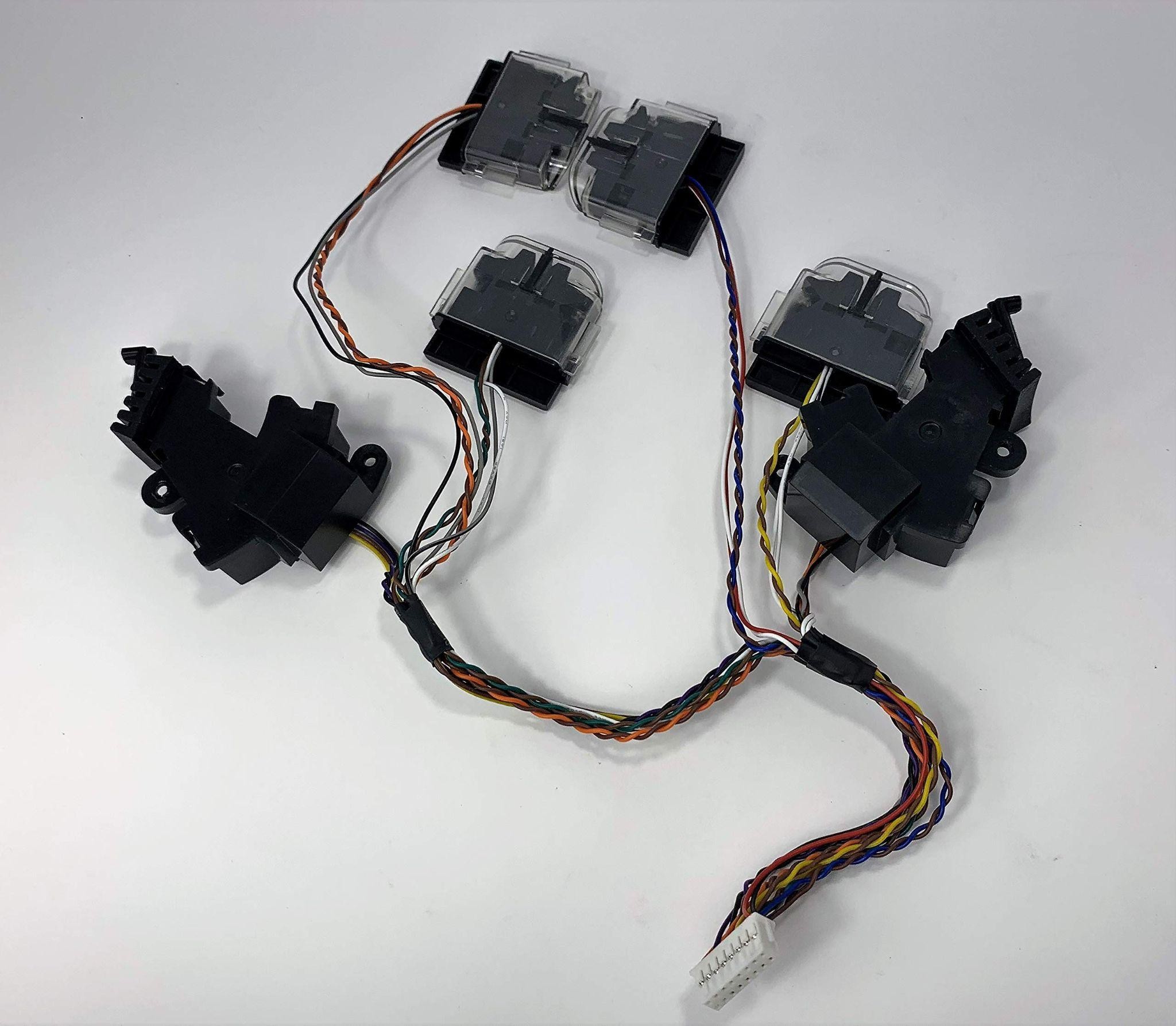 Это датчики высоты и загрязнения (c прозрачным пластиком) и детектор препятствия (две черные штуки побольше)