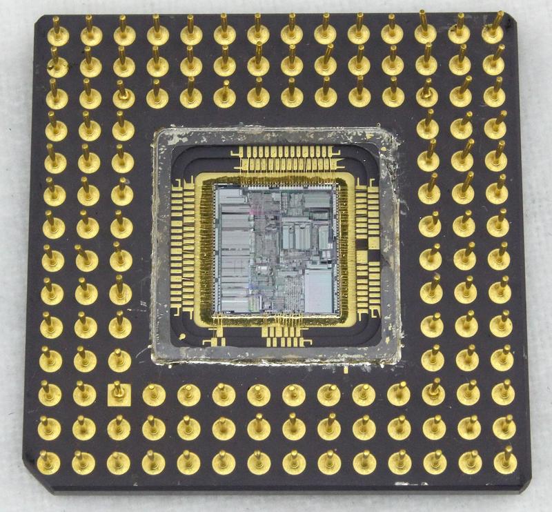 The 386 package with the lid over the die removed.