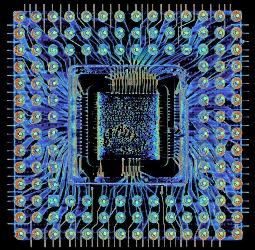 A CT scan of the 386 package. The ceramic package doesn't show up in this image, but it encloses the spiky wires.