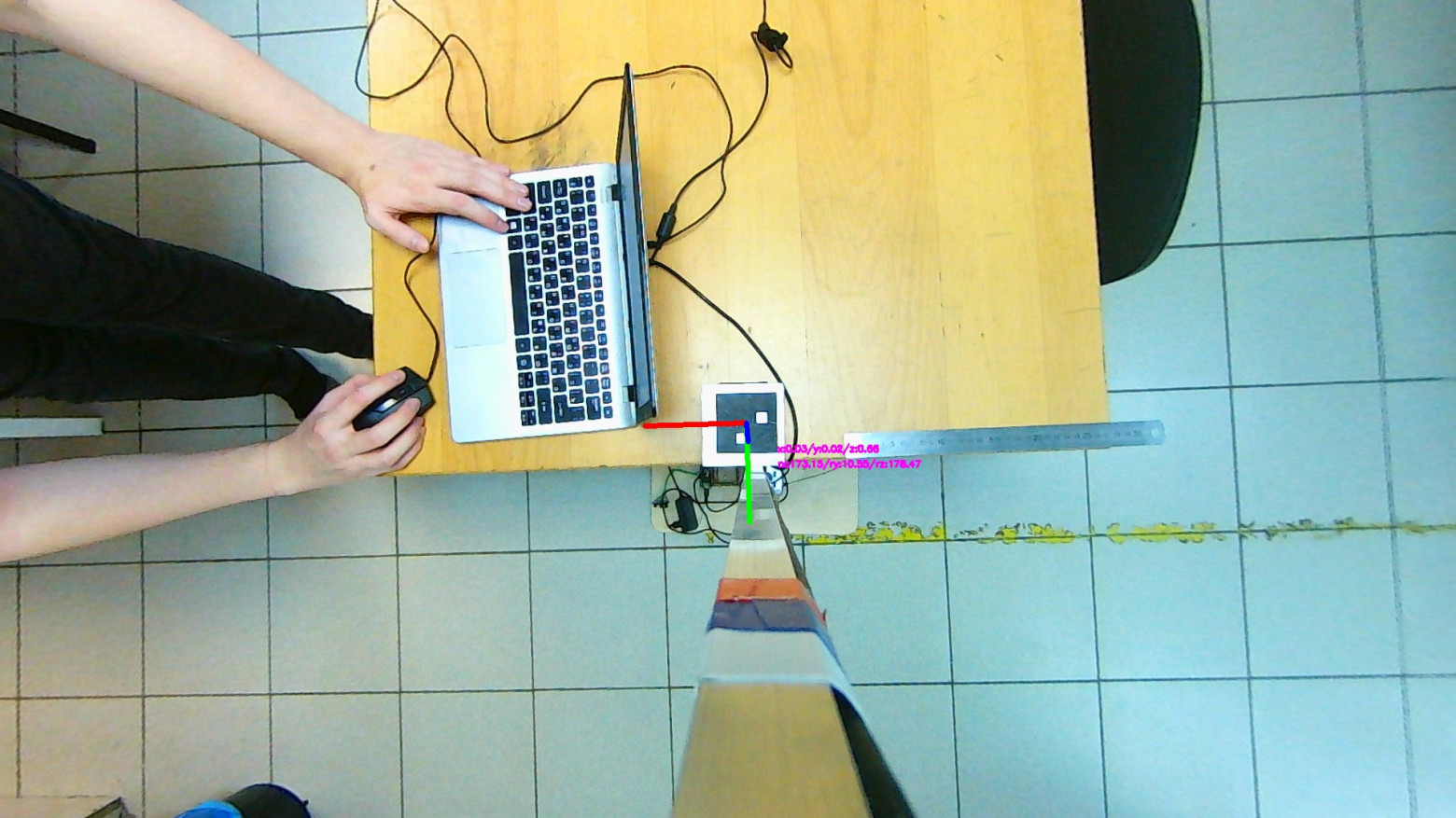 x: 0.03 / y: 0.02 / z: 0.66 | rx: 173.16 / ry: 10.55 / rz: 178.47; x и y близки к 0, так как проекция центра маркера близка к главной точке (оптическому центру)