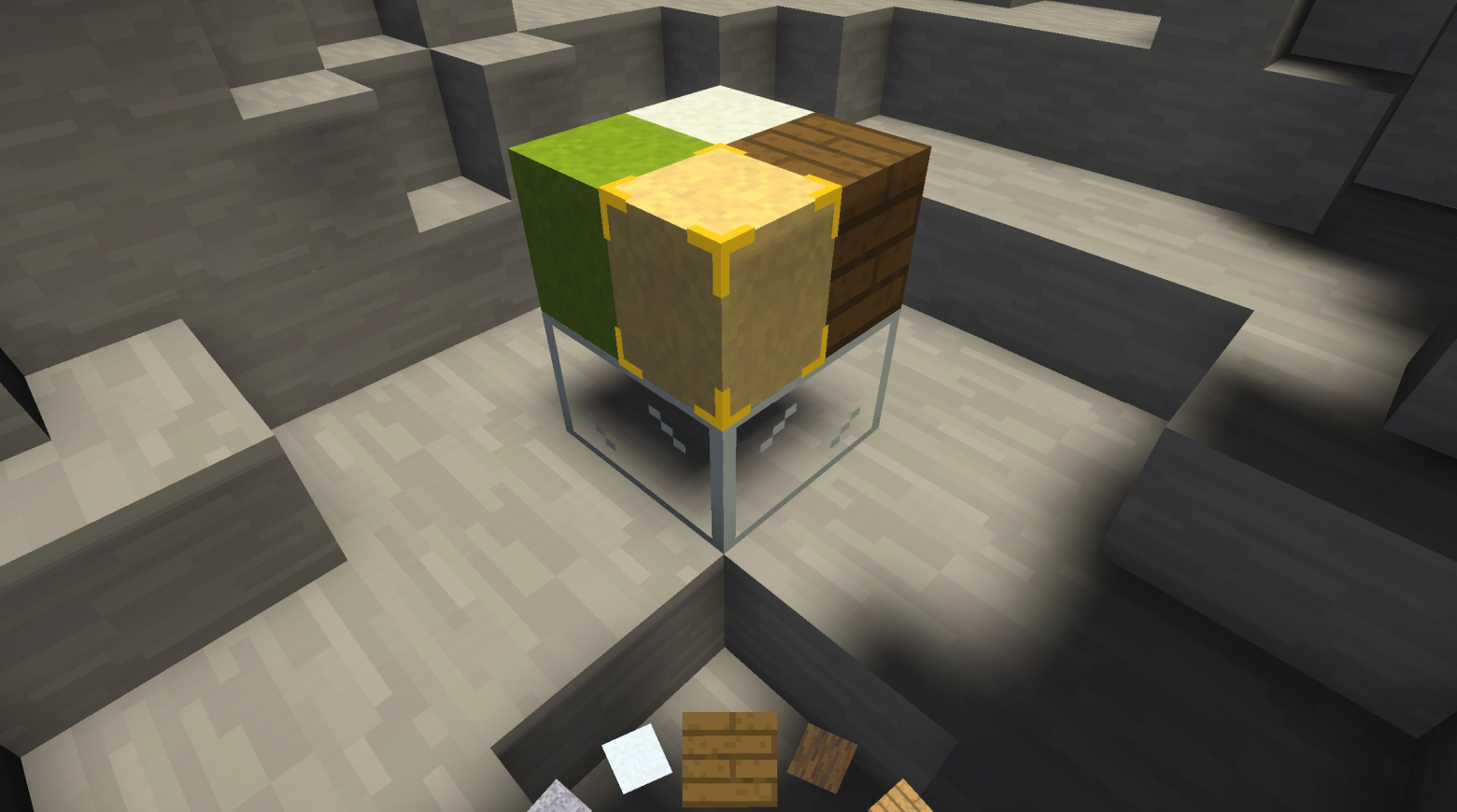 На этом скриншоте показана граница оболочек по вертикали. Четыре разнотипных блока расположены поверх единственного стеклянного блока в оболочке, лежащей уровнем ниже.