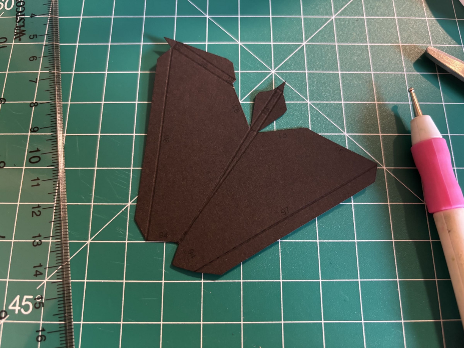 The same part from above, but now scored. Note the visible impressions on the fold lines.