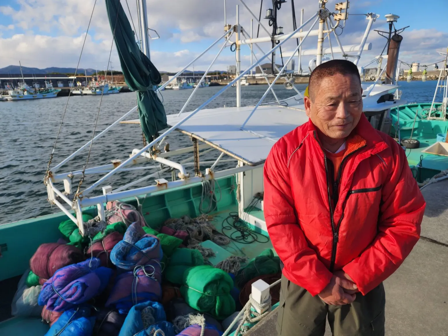 Haruo Ono and his boat at Shinchi harbor, Fukushima. <span class="feature_caption_credit">Thomas A. Bass</span>