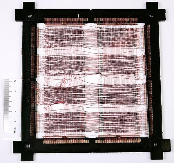 This (somewhat damaged) core memory plane is the commercial version of the planes in the first-generation System/4 Pi computers. Photo by José Luis Briz Velasco, CC BY-SA 4.0, cropped.