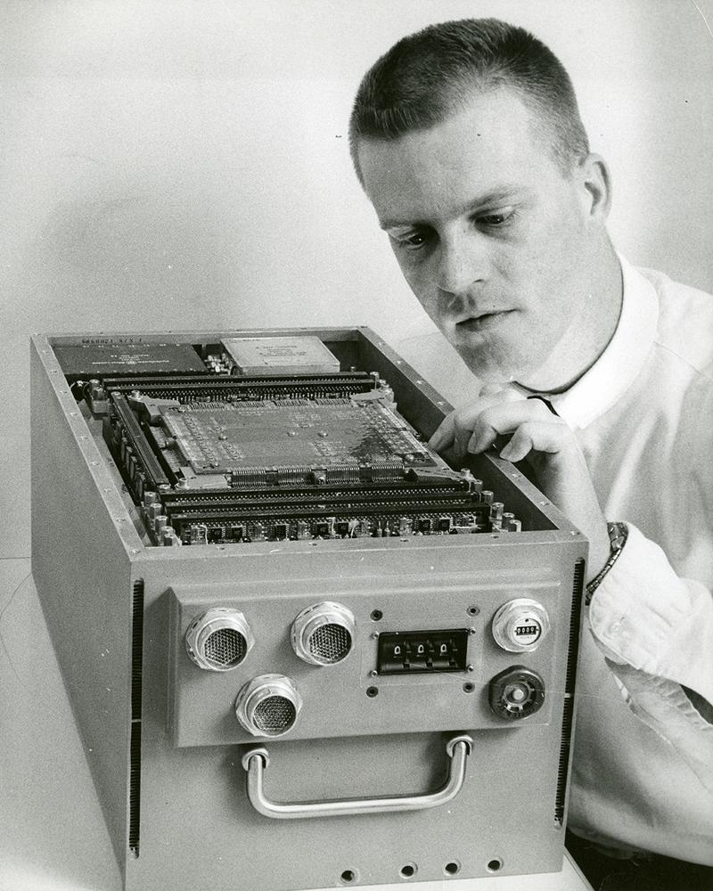 The CP-2 computer, designated the AN/AYK-6. The three-digit dial on the front was covered and fastened with security wire before use, so it must have been important. The core memory stack is in the middle of the computer, with 8K to 16K words of storage. The circuit pages are in front. Photo from an IBM Thread, which also shows a disassembled TC-2 computer.