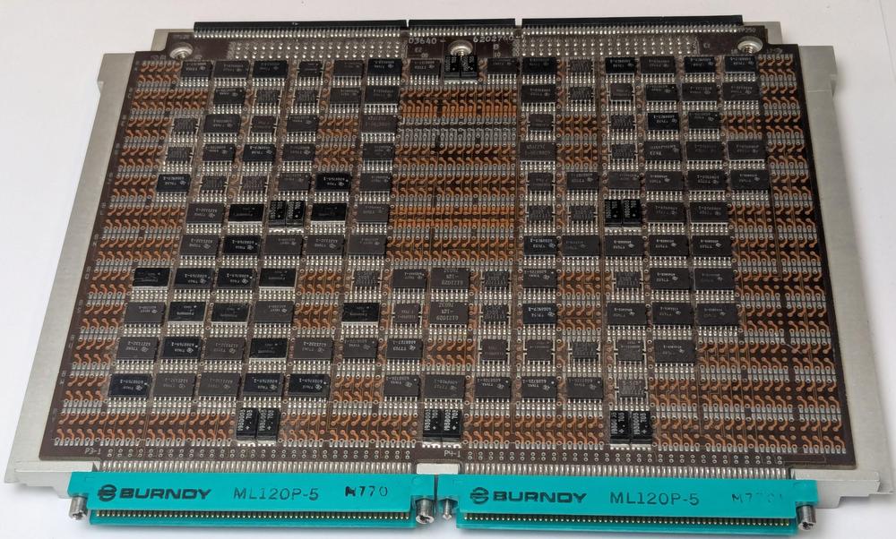 An ML-0 interface board, courtesy of Henry Brandt. This is an interface board with flip-flops, multiplexers, and other TTL chips. The board has different edge connectors from the standard MCS boards and is a slightly different size.
