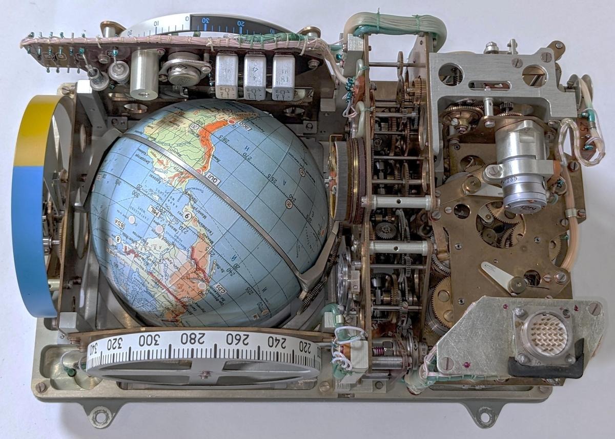 With the case removed, the complex internals of the Globus are visible.