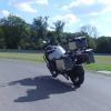 Беспилотный мотоцикл BMW едет по треку: видео