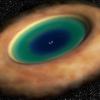 Первый качественный снимок газопылевого кольца вокруг черной дыры