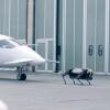 Четырехногий робот буксирует трехтонный самолет: видео