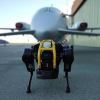 Четырехногий робот смог отбуксировать самолет весом в 3,3 тонны
